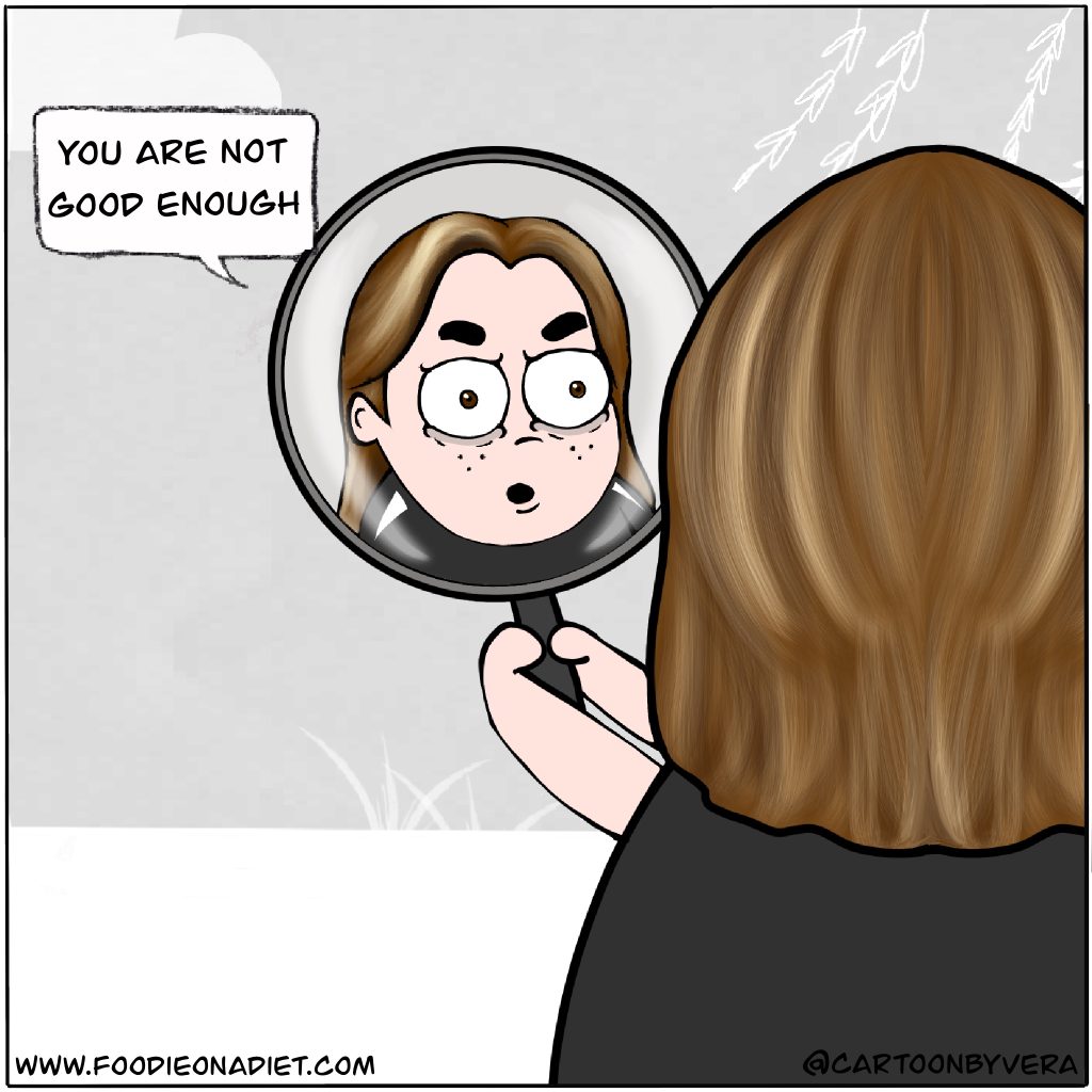 Image of a girl looking into the mirror feeling not good enough